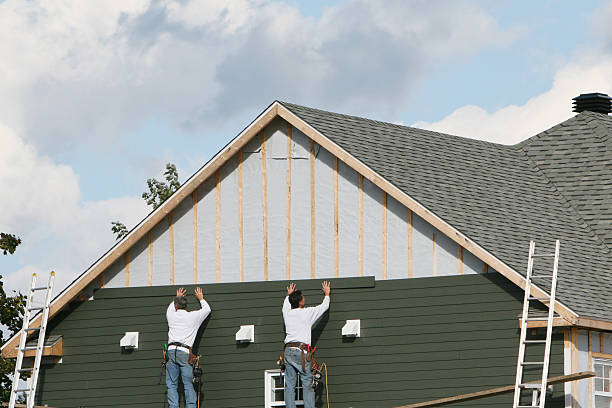 Professional Siding technician working in Sims, NC